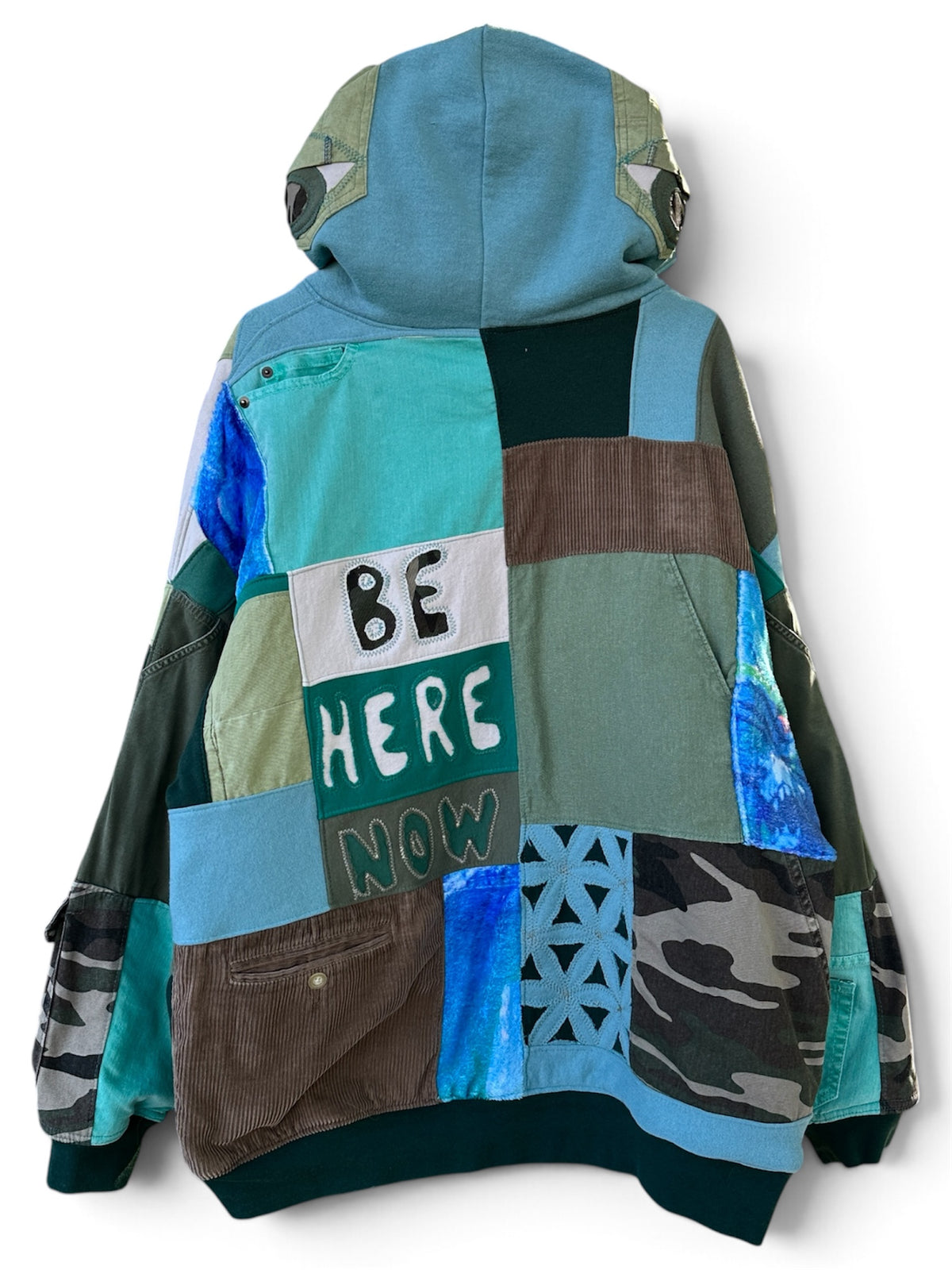 ‘BE HERE NOW’ REVERSIBLE POCKET PATCHWORK COAT - SIZE XL